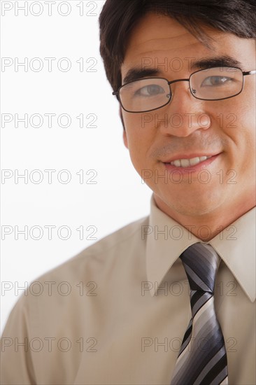 Portrait of business man smiling. Photo : Rob Lewine