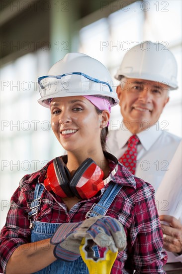 Portrait of manual worker and manager. Photo: db2stock