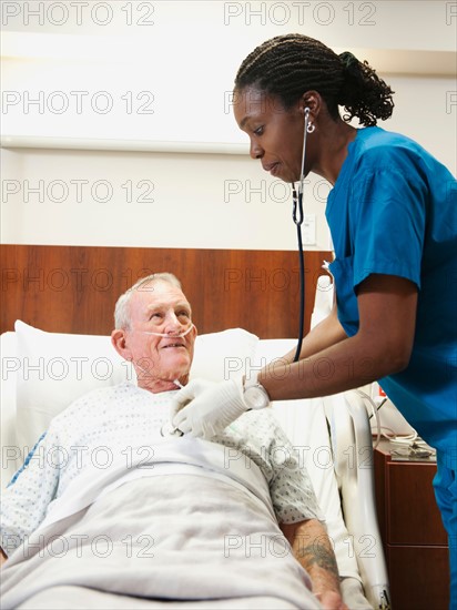Senior patient and nurse.