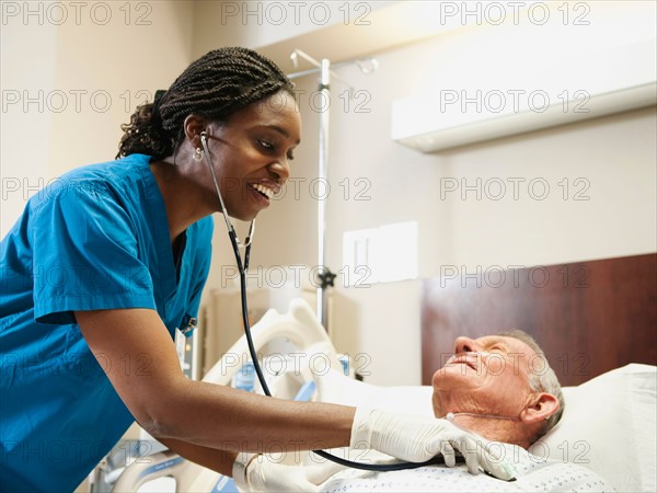 Senior patient and nurse.