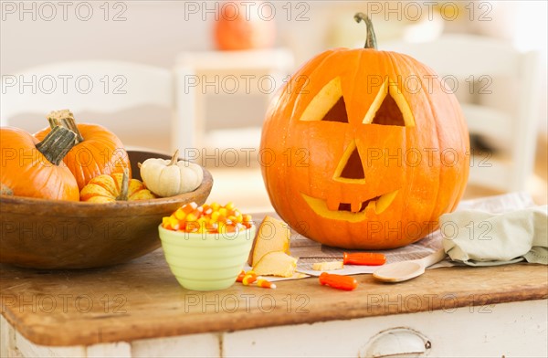 Halloween pumpkin on table.