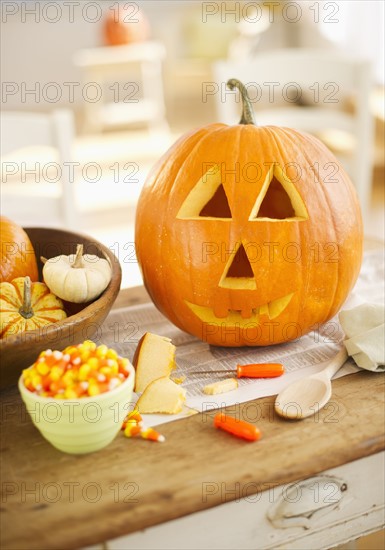 Halloween pumpkin on table.