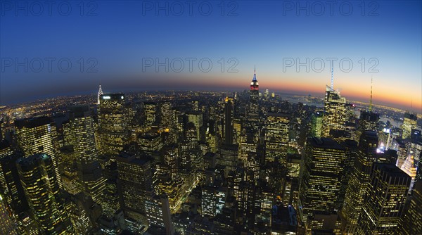USA, New York City, Manhattan skyline at dusk.