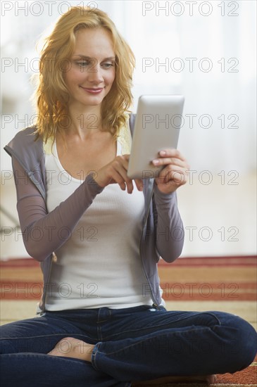 Woman using tablet pc.