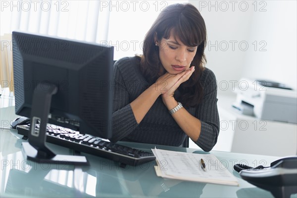 Business woman reading documents.