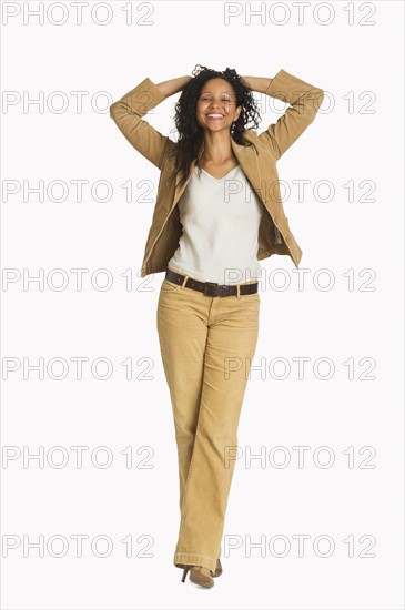 Studio portrait of mid adult woman.