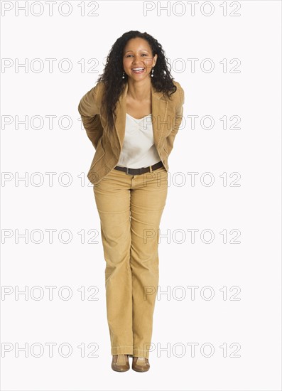 Studio portrait of mid adult woman.