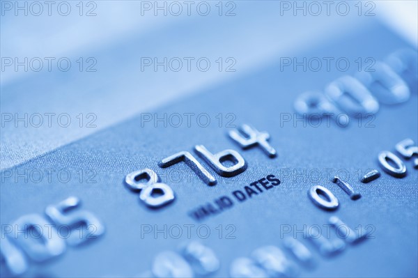 Detail of credit card, studio shot.