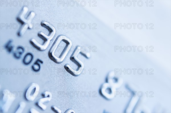 Detail of credit card, studio shot.