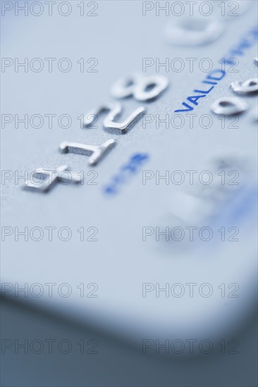 Detail of credit card, studio shot.