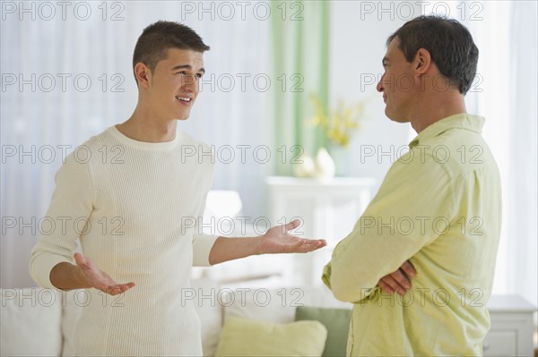 Father and son (16-17) arguing.