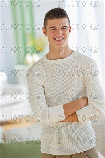 Portrait of teen (16-17) boy at home.