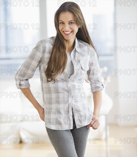 Portrait of attractive woman at home.