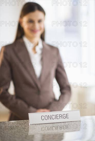 Hotel reception and concierge sign.