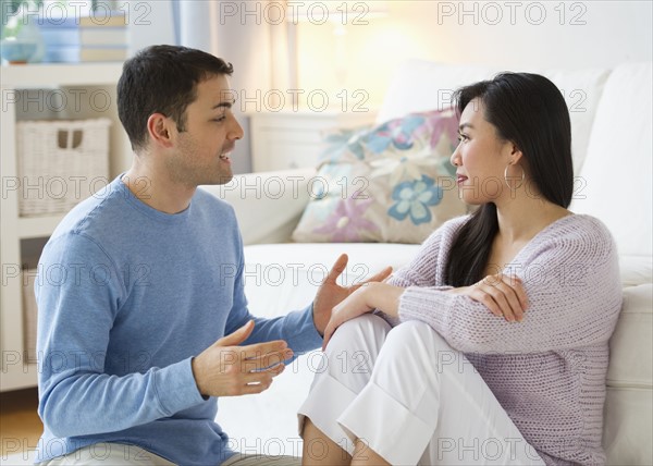 Couple relaxing at home.