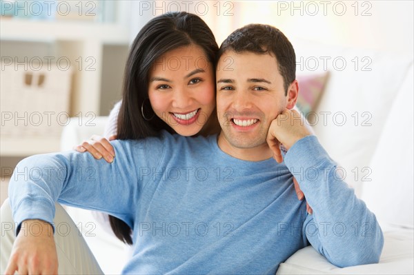 Couple relaxing at home.