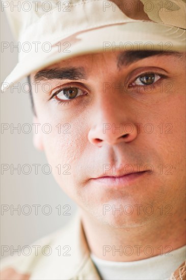 Portrait of soldier, studio shot. Photo: Daniel Grill