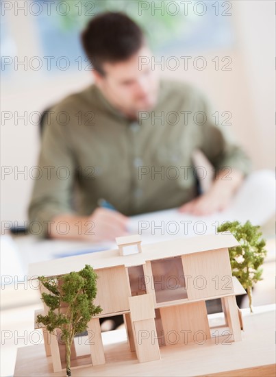 Portrait of architect working in office. Photo : Daniel Grill