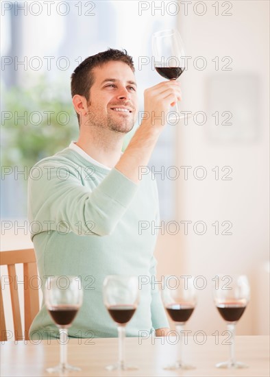 Man tasting wine. Photo : Daniel Grill