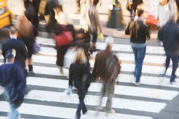 USA, New York City, Manhattan, Pedestrians on zebra crossing. Photo : fotog