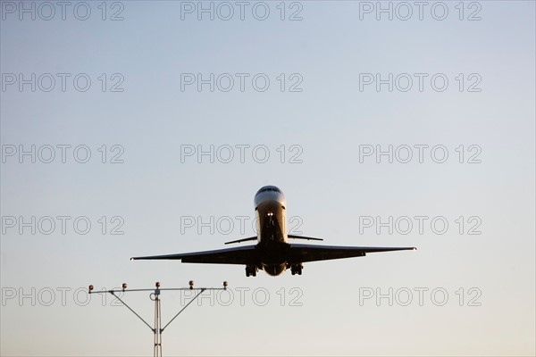 Commercial aeroplane taking off from runway. Photo : fotog