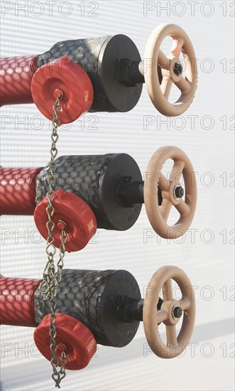 Three valves in a row. Photo : fotog