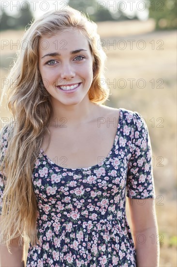 Outdoor portrait of happy teenage girl (16-17) . Photo : Take A Pix Media