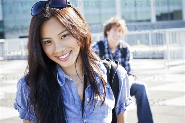 USA, Washington, Seattle, Portrait of young couple, focus on woman. Photo : Take A Pix Media