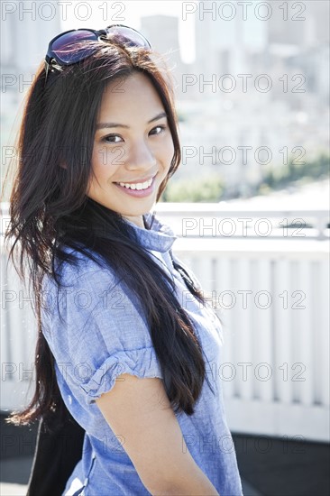 USA, Washington, Seattle, Portrait of young woman outdoors. Photo: Take A Pix Media