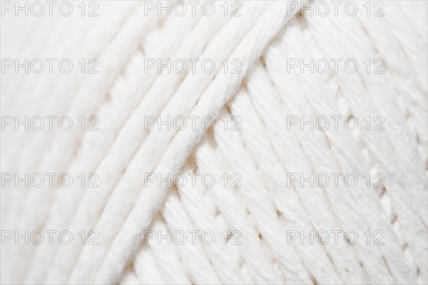 Close-up of ball of white yarn. Photo : Kristin Lee