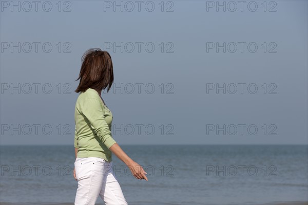 Woman on beach. Photo: Jan Scherders