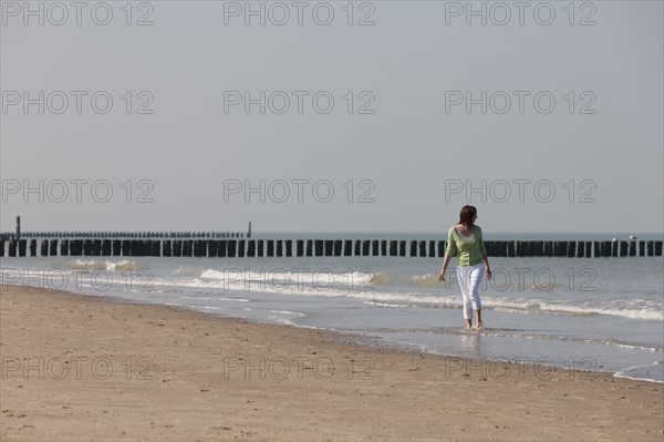 Woman on beach. Photo: Jan Scherders