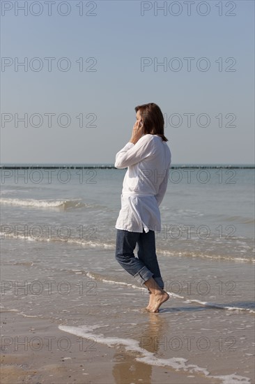 Woman on beach. Photo: Jan Scherders