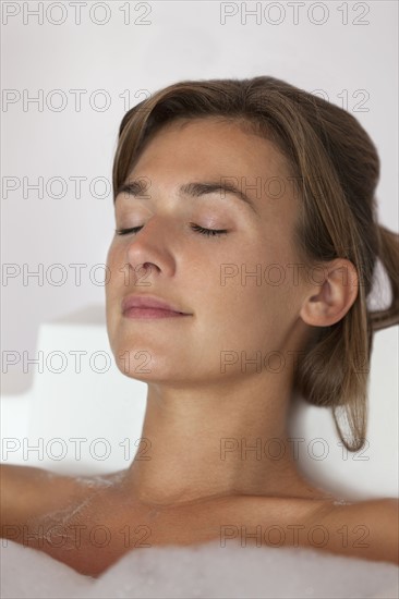 Woman taking bath. Photo : Jan Scherders