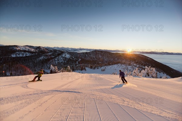 USA, Montana, Whitefish, Tourists on ski slope. Photo : Noah Clayton