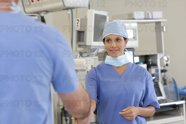 Surgeons in operating room. Photo : db2stock