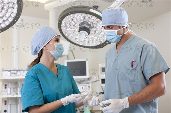 Surgeons in operating room. Photo: db2stock