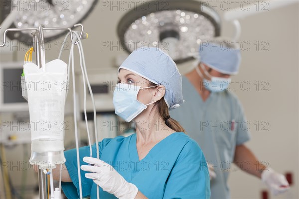 Surgeons getting ready for surgery. Photo : db2stock