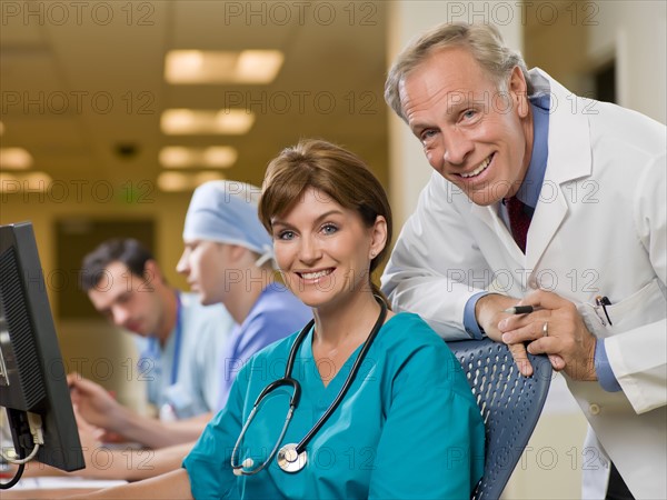 Portrait of female surgeon and male doctor. Photo : db2stock