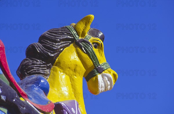 Mexico, Carousel painted horse used as building decor. Photo : DKAR Images