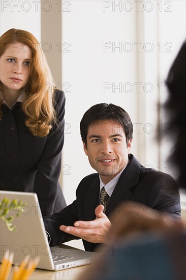 Business people at meeting. Photo : Rob Lewine