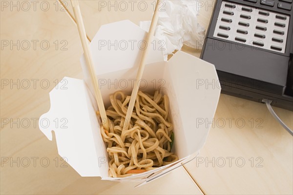 Takeout food on desk. Photo : Rob Lewine