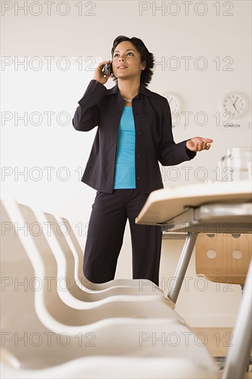 Businesswoman talking on phone. Photo : Rob Lewine
