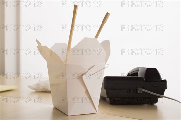 Takeout food on desk. Photo: Rob Lewine