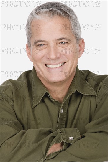 Studio portrait of mature man. Photo : Rob Lewine