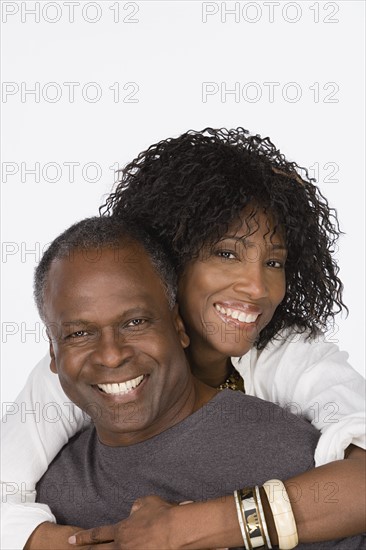 Studio portrait of mature couple. Photo : Rob Lewine