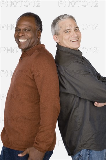 Studio portrait of two mature men. Photo : Rob Lewine