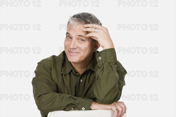 Studio portrait of mature man. Photo : Rob Lewine