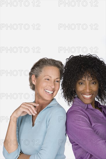 Studio portrait of two mature women. Photo: Rob Lewine