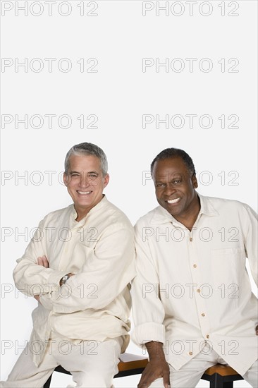 Studio portrait of two mature men. Photo: Rob Lewine